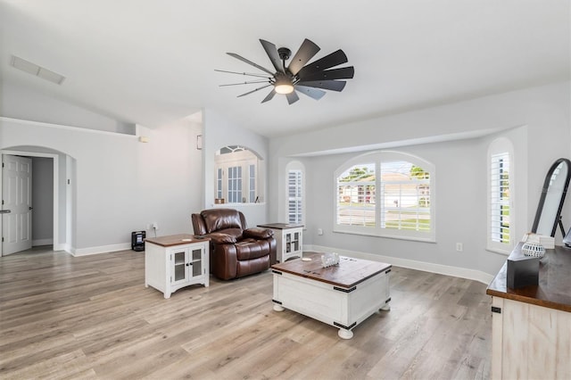 198 Porto Velho St, Punta Gorda, FL 33983 - living area featuring arched walkways, ceiling fan, lofted ceiling, and light wood finished floors