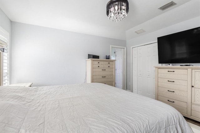 198 Porto Velho St, Punta Gorda, FL 33983 - bedroom featuring a chandelier and a closet