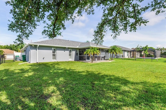 198 Porto Velho St, Punta Gorda, FL 33983 - rear view of house with a sunroom and stucco siding