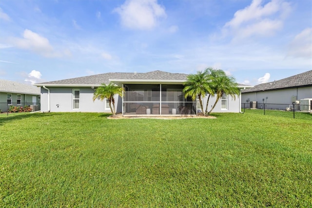198 Porto Velho St, Punta Gorda, FL 33983 - back of house featuring a sunroom, stucco siding, and a shingled roof