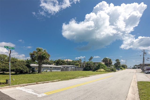 686 S Atlantic Ave Unit 1-8, Cocoa Beach, FL 32931 - view of asphalt road featuring curbs