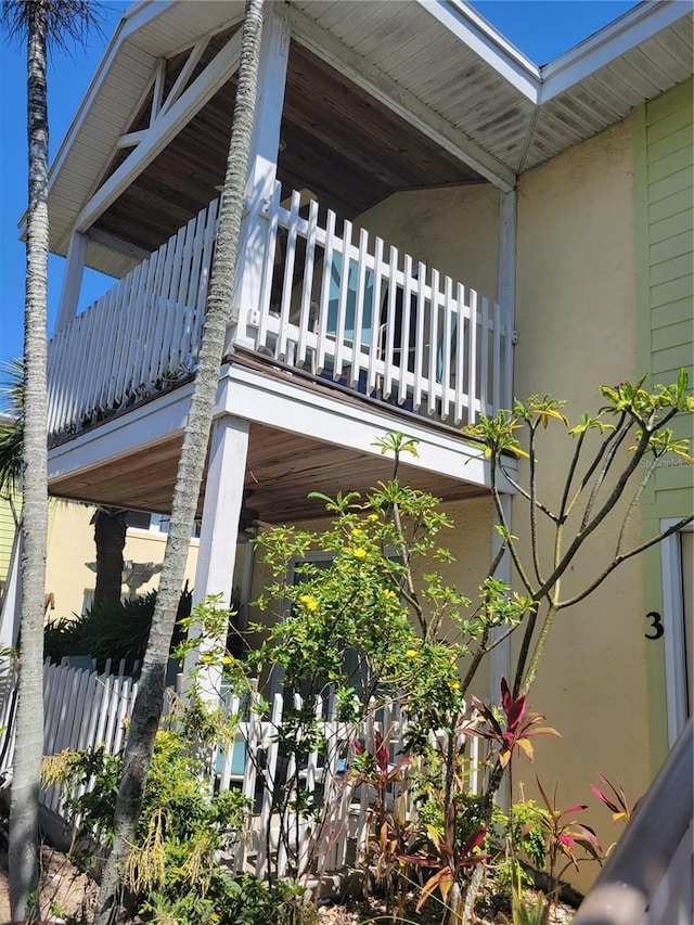 686 S Atlantic Ave Unit 1-8, Cocoa Beach, FL 32931 - view of side of property featuring a balcony and stucco siding