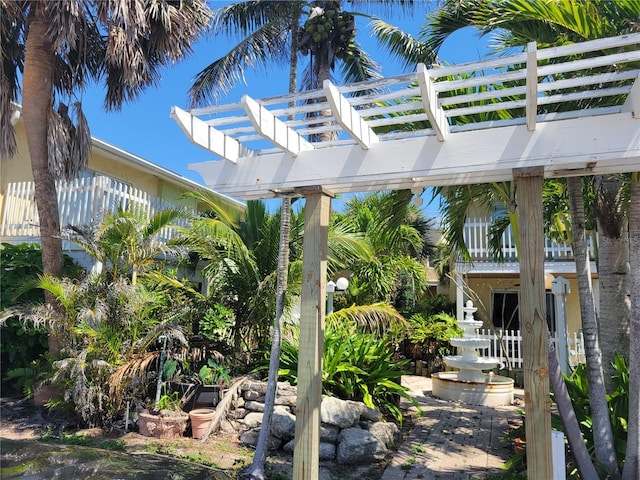 686 S Atlantic Ave Unit 1-8, Cocoa Beach, FL 32931 - view of yard featuring a pergola