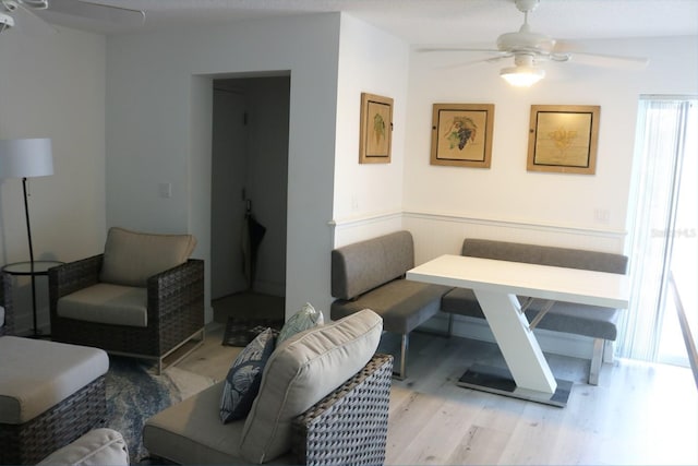 686 S Atlantic Ave Unit 1-8, Cocoa Beach, FL 32931 - living area with a ceiling fan and light wood-style flooring