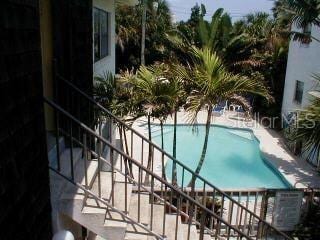 686 S Atlantic Ave Unit 1-8, Cocoa Beach, FL 32931 - view of pool featuring stairway