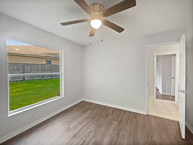 4615 River Overlook Dr, Valrico, FL 33596 - empty room with wood finished floors and ceiling fan