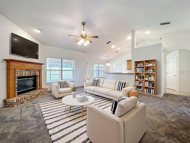 16634 Pine Timber Ave, Montverde, FL 34756 - living area with carpet, vaulted ceiling, a ceiling fan, a brick fireplace, and recessed lighting