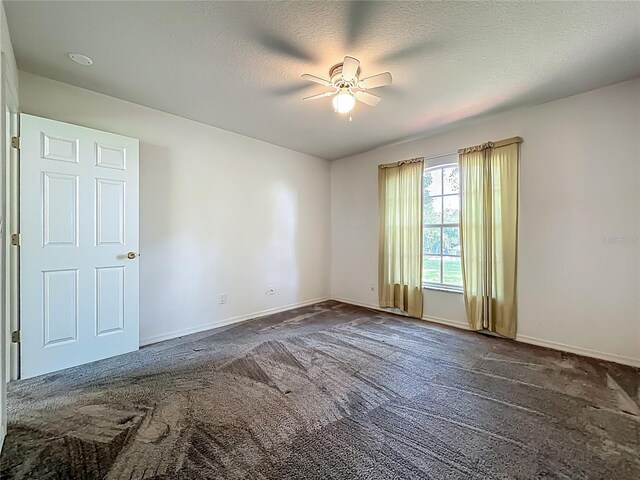 16634 Pine Timber Ave, Montverde, FL 34756 - unfurnished room featuring dark colored carpet and a ceiling fan
