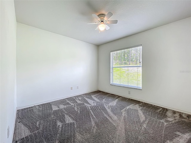16634 Pine Timber Ave, Montverde, FL 34756 - spare room featuring carpet flooring and a ceiling fan