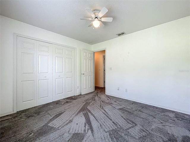 16634 Pine Timber Ave, Montverde, FL 34756 - unfurnished bedroom with carpet, a closet, and a ceiling fan
