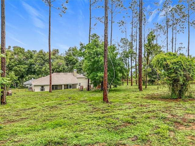16634 Pine Timber Ave, Montverde, FL 34756 - view of grassy yard with view of scattered trees