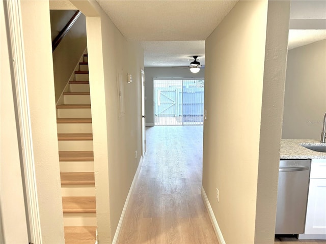 6054 Amberly Ct Unit T21, Orlando, FL 32822 - hall featuring light wood-style floors and stairway