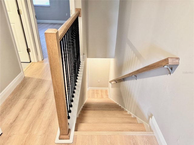 6054 Amberly Ct Unit T21, Orlando, FL 32822 - stairway with wood finished floors and baseboards