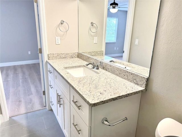 6054 Amberly Ct Unit T21, Orlando, FL 32822 - bathroom featuring vanity, ceiling fan, and wood finished floors