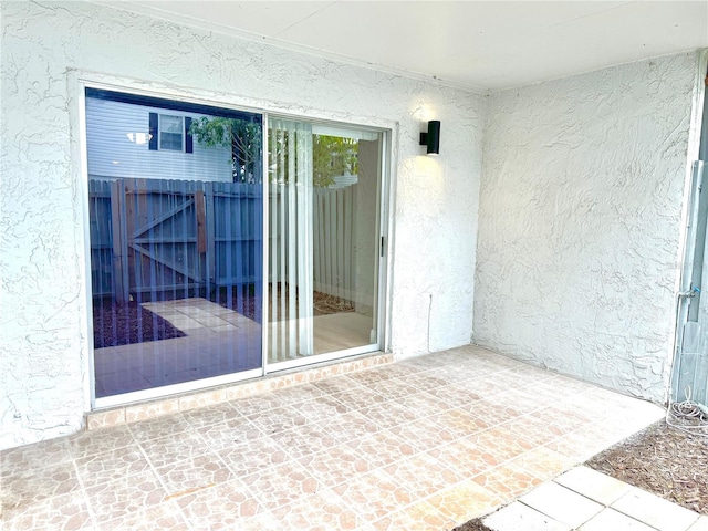 6054 Amberly Ct Unit T21, Orlando, FL 32822 - view of patio with a gate