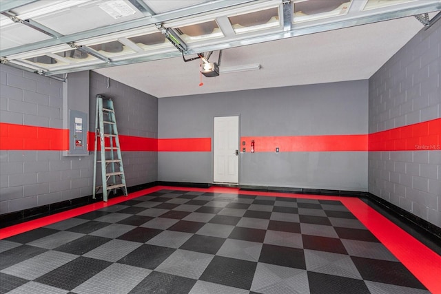5072 Cypress Branch Pt, Oviedo, FL 32765 - garage featuring electric panel, a garage door opener, and concrete block wall