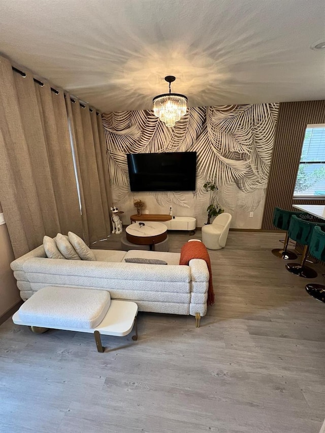 3292 Tranquil Trl, Kissimmee, FL 34747 - living area with a chandelier and wood finished floors