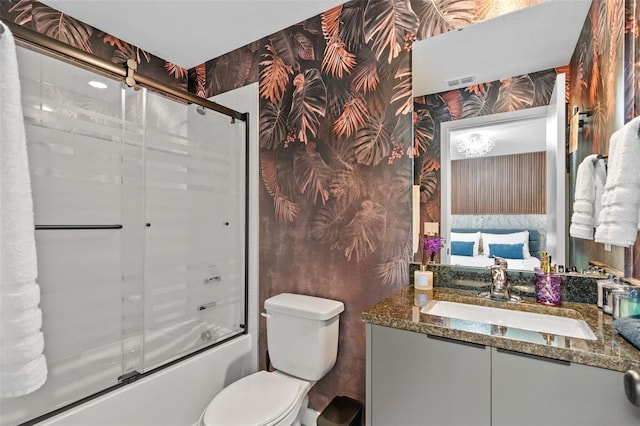 3292 Tranquil Trl, Kissimmee, FL 34747 - bathroom with wallpapered walls, vanity, and combined bath / shower with glass door