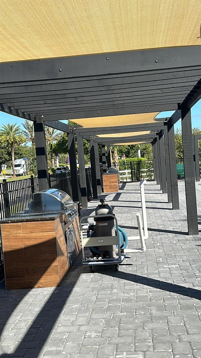 3292 Tranquil Trl, Kissimmee, FL 34747 - view of patio / terrace featuring exterior kitchen