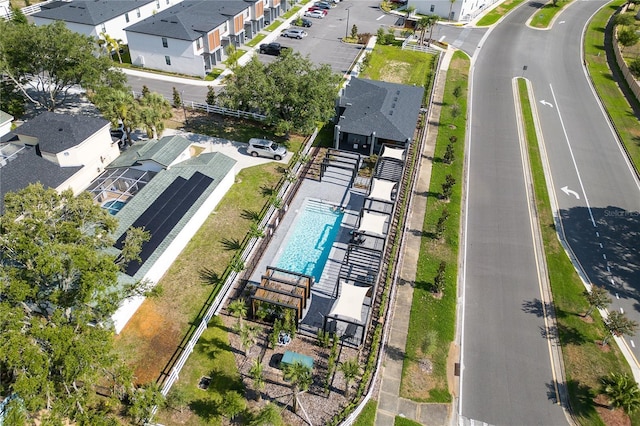 3292 Tranquil Trl, Kissimmee, FL 34747 - aerial overview of property's location featuring a pool area and nearby suburban area