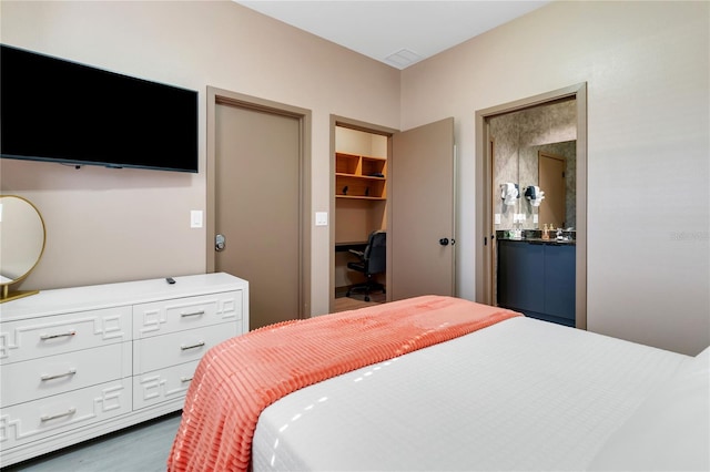 3292 Tranquil Trl, Kissimmee, FL 34747 - bedroom with an office area and a walk in closet