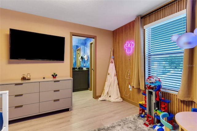 3292 Tranquil Trl, Kissimmee, FL 34747 - recreation room featuring light wood-style floors and plenty of natural light