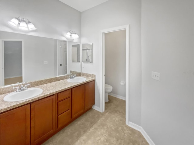 6303 Twin Bridges Dr, Zephyrhills, FL 33541 - full bathroom featuring double vanity and tile patterned flooring