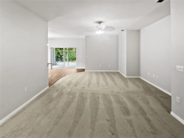 6303 Twin Bridges Dr, Zephyrhills, FL 33541 - unfurnished room with a ceiling fan and carpet flooring