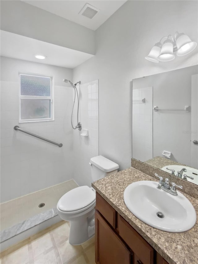 6303 Twin Bridges Dr, Zephyrhills, FL 33541 - full bathroom with a tile shower and vanity