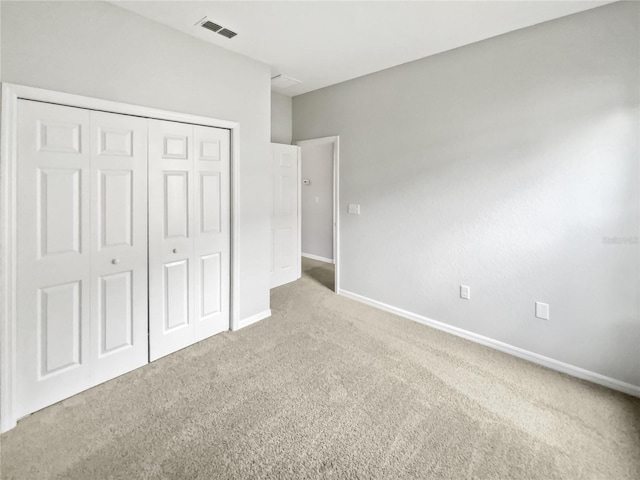 6303 Twin Bridges Dr, Zephyrhills, FL 33541 - unfurnished bedroom featuring carpet and a closet