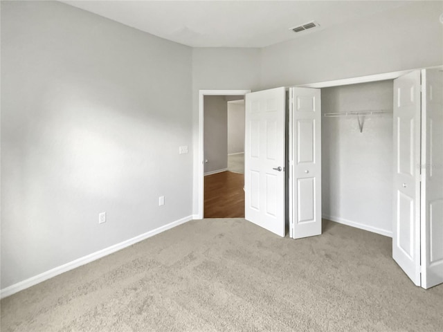 6303 Twin Bridges Dr, Zephyrhills, FL 33541 - unfurnished bedroom with carpet flooring and a closet