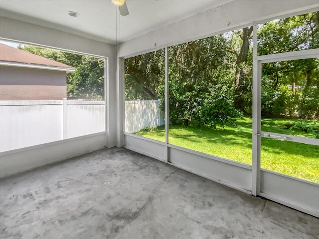 6303 Twin Bridges Dr, Zephyrhills, FL 33541 - unfurnished sunroom with ceiling fan