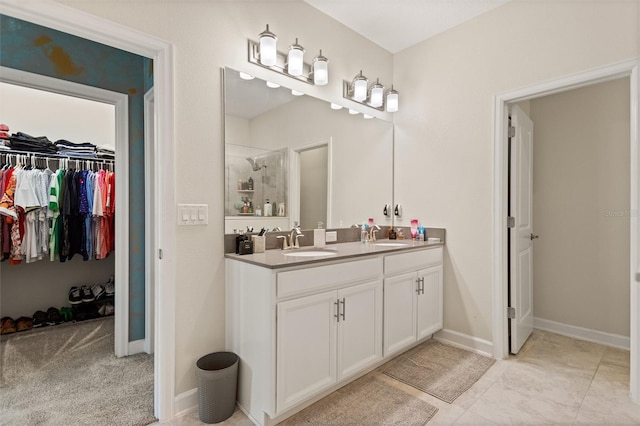 8998 Croquet Ct, Champions Gate, FL 33896 - full bath featuring double vanity, a walk in shower, and a spacious closet
