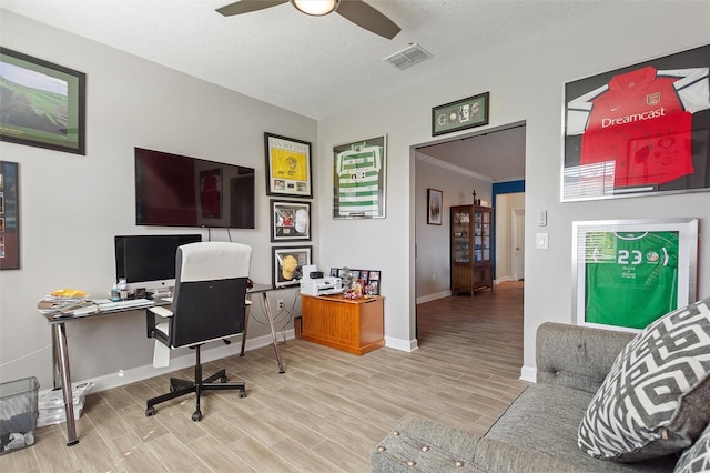 8998 Croquet Ct, Champions Gate, FL 33896 - office area featuring ceiling fan, wood finished floors, and a textured ceiling