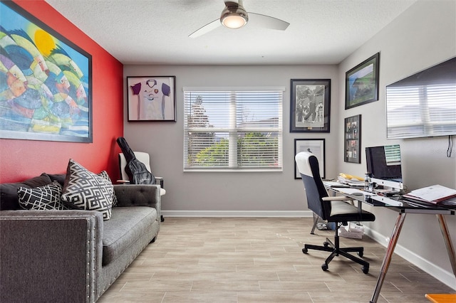 8998 Croquet Ct, Champions Gate, FL 33896 - office with a ceiling fan, wood finished floors, and a textured ceiling