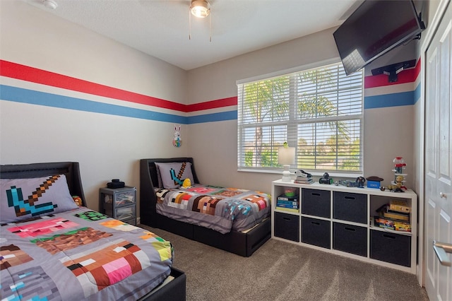 8998 Croquet Ct, Champions Gate, FL 33896 - bedroom with carpet floors and a ceiling fan