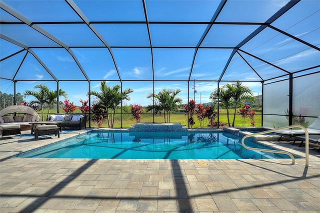 8998 Croquet Ct, Champions Gate, FL 33896 - view of swimming pool featuring an outdoor living space, a pool with connected hot tub, and a patio