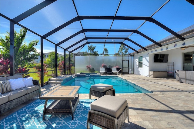 8998 Croquet Ct, Champions Gate, FL 33896 - view of swimming pool with outdoor lounge area, a patio area, and a lanai