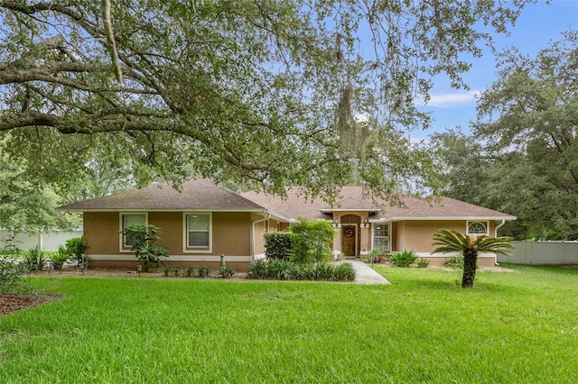 12404 SW 31st Ave, Archer, FL 32618 - ranch-style home with stucco siding