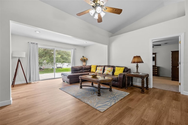 12404 SW 31st Ave, Archer, FL 32618 - living area with vaulted ceiling, a ceiling fan, and wood finished floors