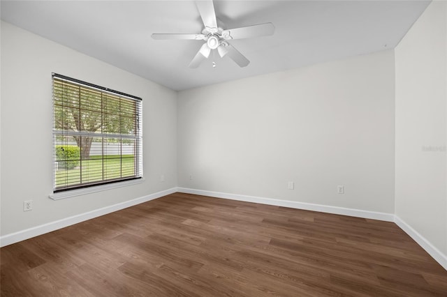 12404 SW 31st Ave, Archer, FL 32618 - spare room with dark wood-type flooring and ceiling fan