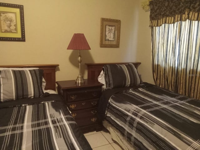 1624 Grand St, Orlando, FL 32805 - bedroom featuring light tile patterned floors