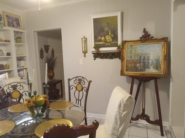 1624 Grand St, Orlando, FL 32805 - tiled dining room featuring built in features and ornamental molding