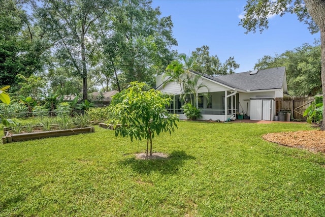 1237 Erik Ct, Altamonte Springs, FL 32714 - view of yard featuring a sunroom and a vegetable garden