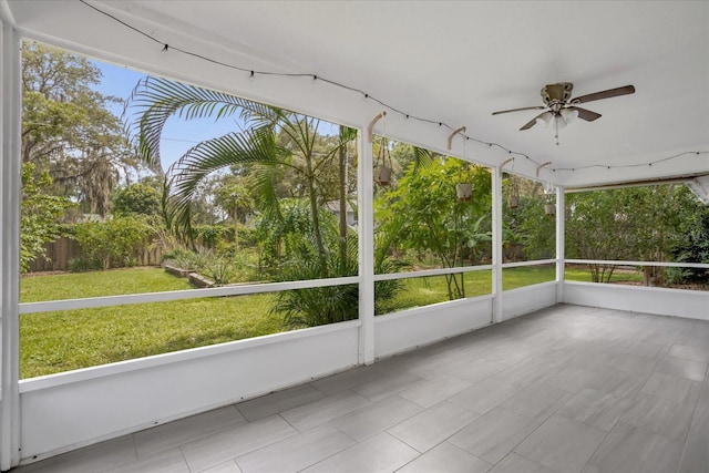 1237 Erik Ct, Altamonte Springs, FL 32714 - unfurnished sunroom with a ceiling fan and plenty of natural light