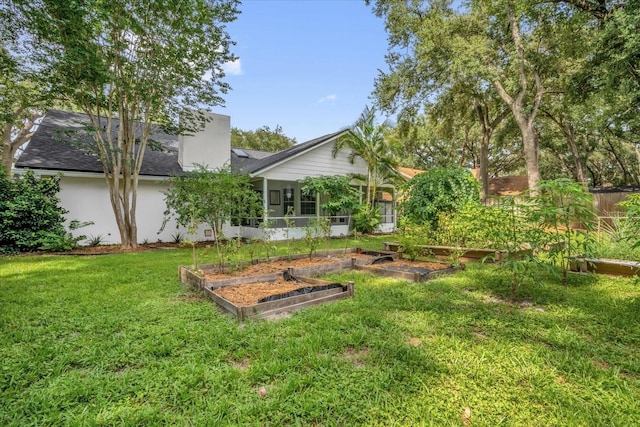 1237 Erik Ct, Altamonte Springs, FL 32714 - view of grassy yard featuring a vegetable garden