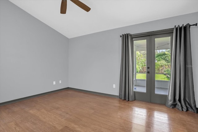 1237 Erik Ct, Altamonte Springs, FL 32714 - spare room with french doors, ceiling fan, wood finished floors, and vaulted ceiling