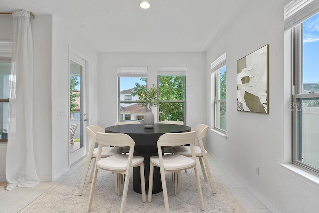 1193 Woods Landing Dr, Minneola, FL 34715 - dining space featuring baseboards