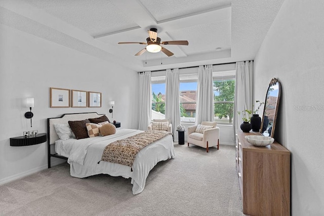 1193 Woods Landing Dr, Minneola, FL 34715 - carpeted bedroom with a textured ceiling, a ceiling fan, and coffered ceiling