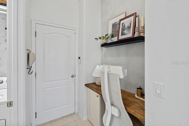 1193 Woods Landing Dr, Minneola, FL 34715 - laundry room featuring light tile patterned floors